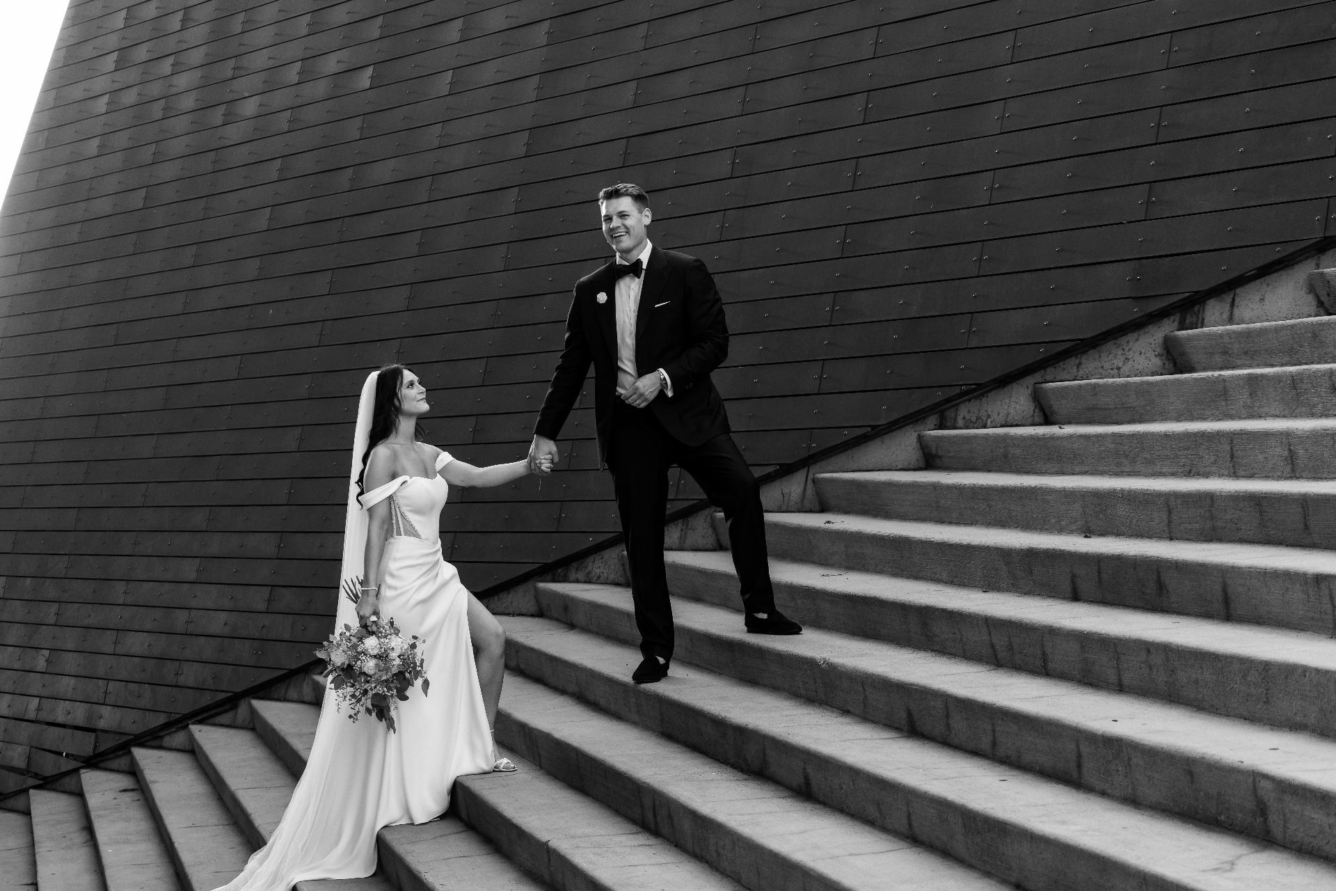 Newlyweds walking together at their Northeast Ohio wedding